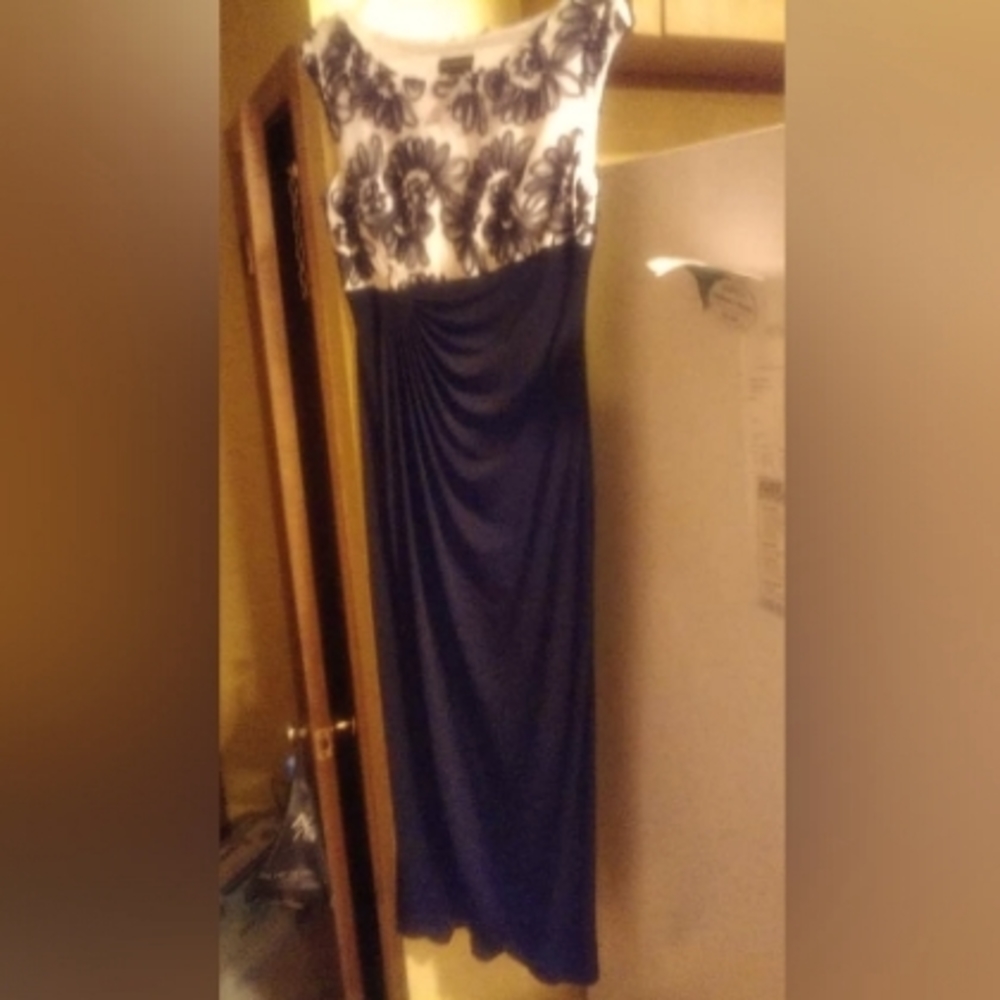 Size 12 floor length gown over the head slip on no zippers brand new black/white